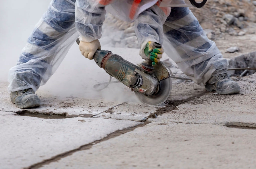 Concrete Driveway Repair: Filling Small Cracks - Concrete Contractors